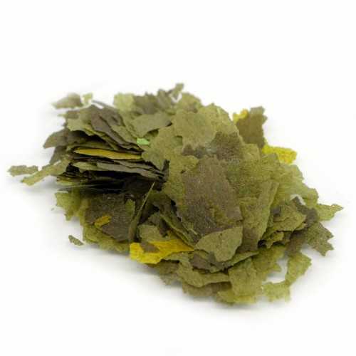 Vegetable flakes, feed in tropical fish flakes...